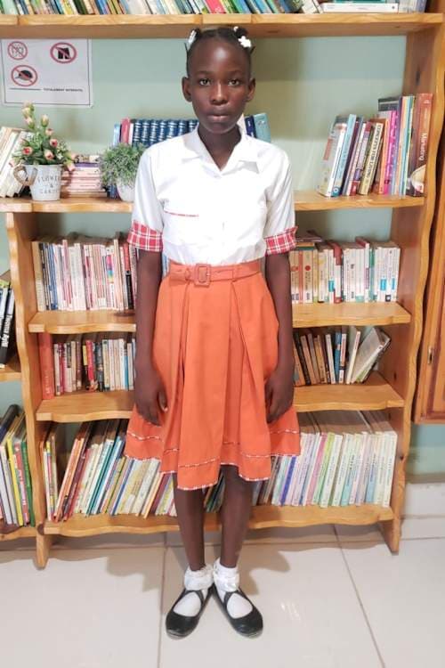 An unsponsored girl named Almatine from Haiti who is vulnerable to exploitation and has waited 912 days for a sponsor.