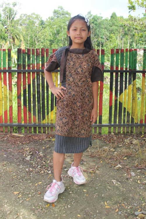 An unsponsored girl named Siska from Indonesia who has waited 368 days for a sponsor.