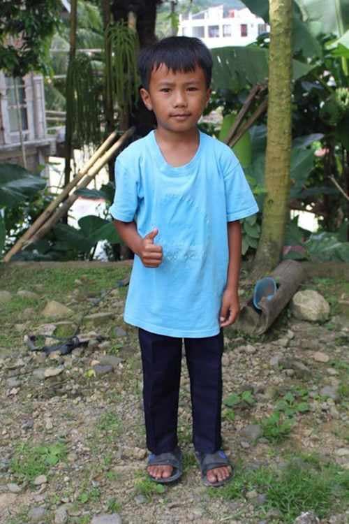 An unsponsored boy named Ibe from Indonesia who has waited 419 days for a sponsor.