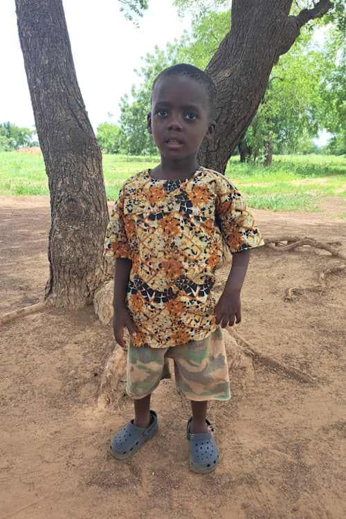 An unsponsored boy named Joshua from Ghana who lives in an AIDS-affected area and has waited 335 days for a sponsor.