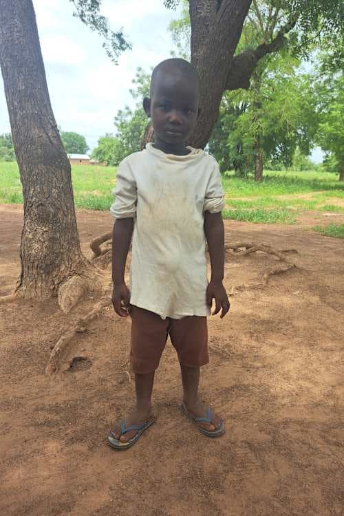 An unsponsored boy named Esasaamuan from Ghana who lives in an AIDS-affected area and has waited 396 days for a sponsor.