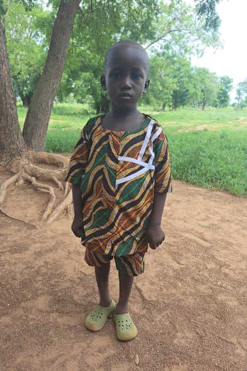 An unsponsored boy named Nigeegna from Ghana who lives in an AIDS-affected area and has waited 335 days for a sponsor.