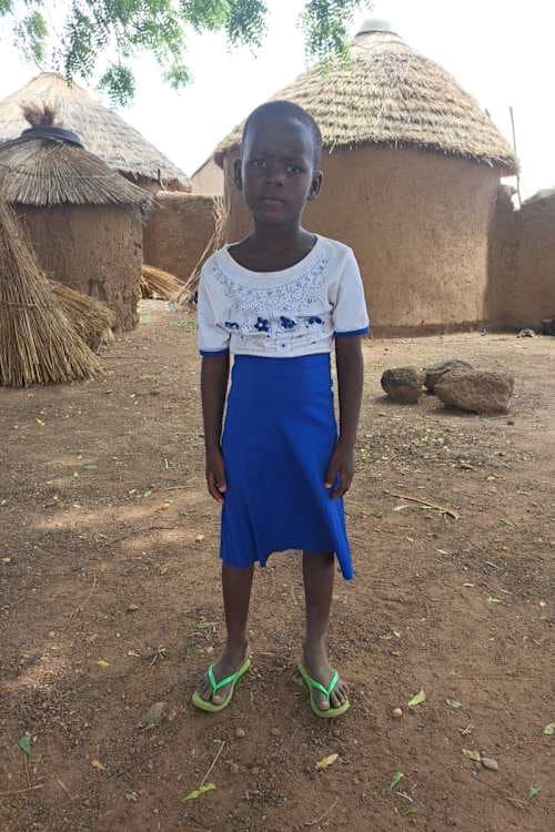 An unsponsored girl named Freda from Ghana who lives in an AIDS-affected area and has waited 345 days for a sponsor.