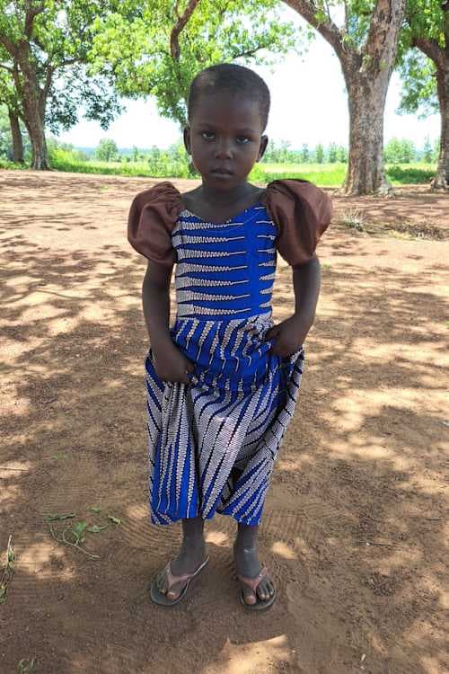 An unsponsored girl named Nigarbe from Ghana who lives in an AIDS-affected area and has waited 336 days for a sponsor.
