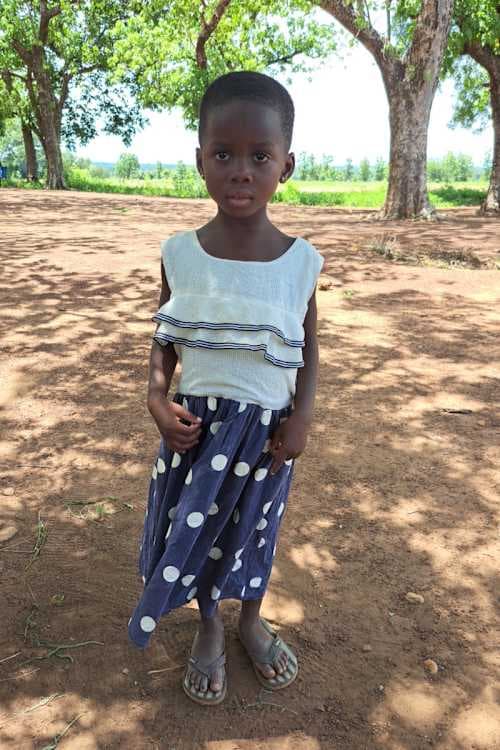 An unsponsored girl named Philo from Ghana who lives in an AIDS-affected area and has waited 336 days for a sponsor.
