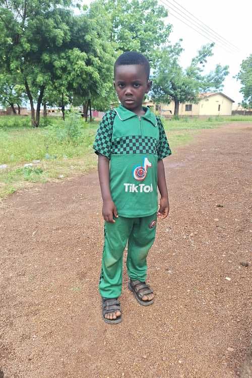 An unsponsored boy named Uwumboragntimi from Ghana who lives in an AIDS-affected area and has waited 323 days for a sponsor.