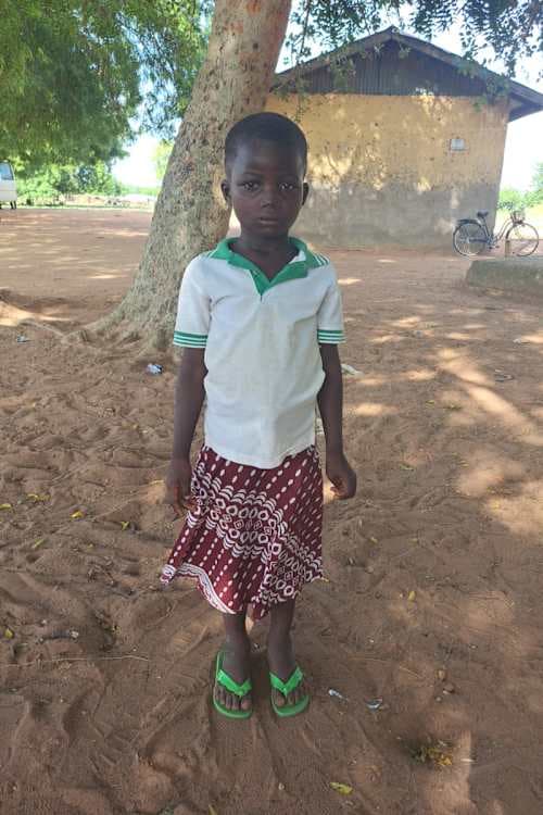 An unsponsored boy named N-Yaagbanbi from Ghana who lives in an AIDS-affected area and has waited 334 days for a sponsor.