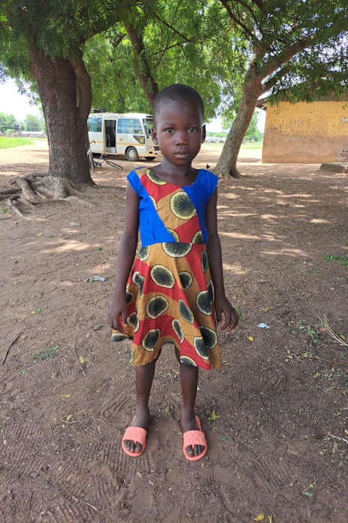 An unsponsored girl named N-monlir from Ghana who lives in an AIDS-affected area and has waited 342 days for a sponsor.