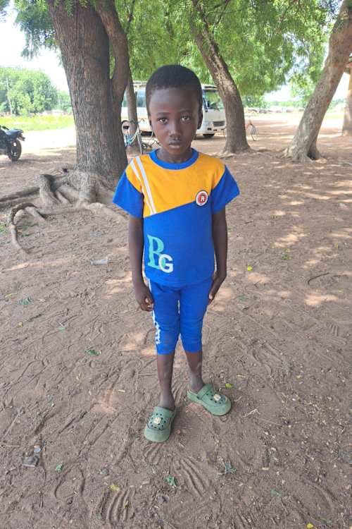 An unsponsored boy named N-tinyibor from Ghana who lives in an AIDS-affected area and has waited 334 days for a sponsor.