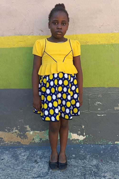 An unsponsored girl named Midline from Haiti who is vulnerable to exploitation and has waited 719 days for a sponsor.