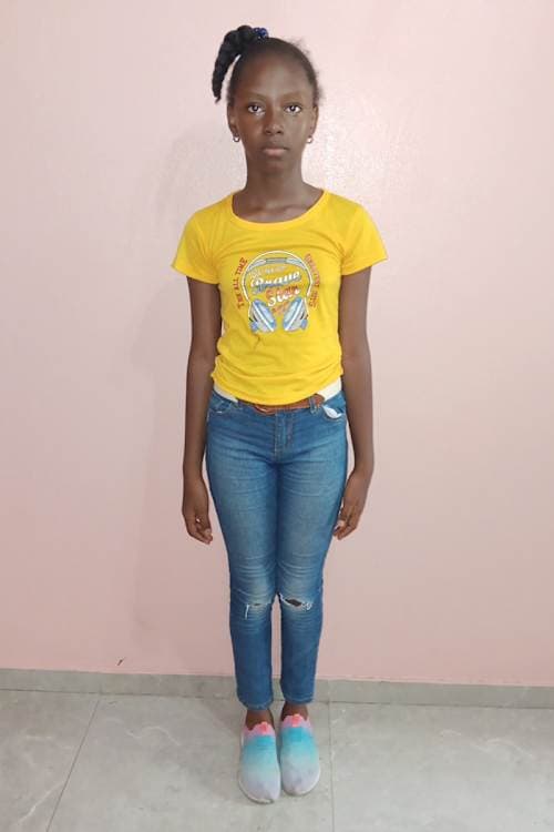 An unsponsored girl named Dodo from Haiti who is vulnerable to exploitation and has waited 1049 days for a sponsor.