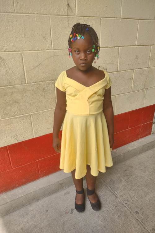 An unsponsored girl named Marie from Haiti who is vulnerable to exploitation and has waited 584 days for a sponsor.