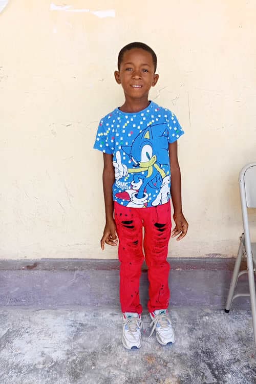 An unsponsored boy named Stevenson from Haiti who is vulnerable to exploitation and has waited 476 days for a sponsor.