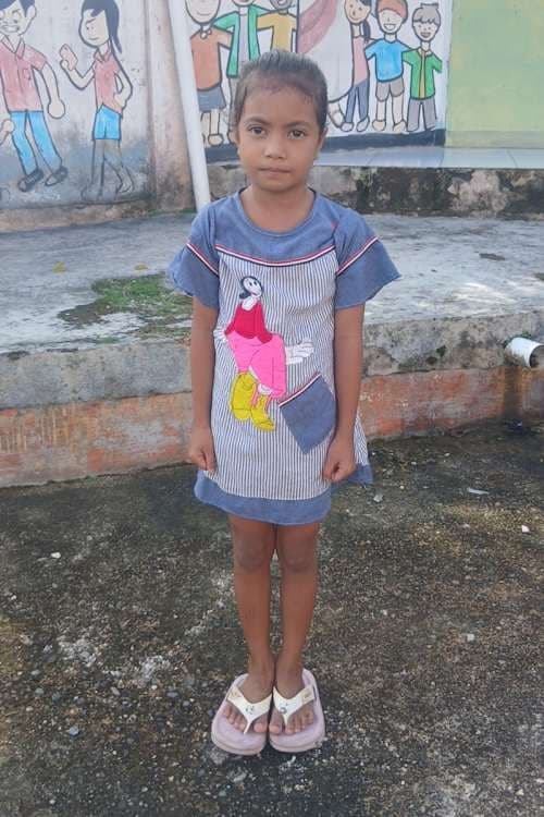 An unsponsored girl named Delvi from Indonesia who has waited 546 days for a sponsor.