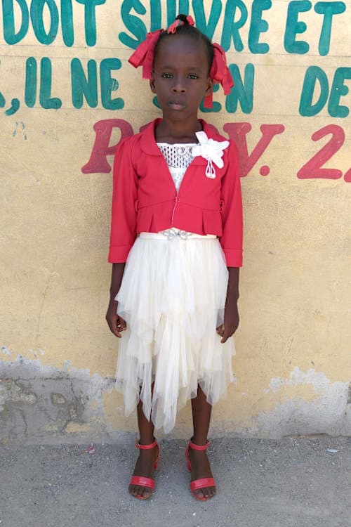 An unsponsored girl named Gigi from Haiti who is vulnerable to exploitation and has waited 608 days for a sponsor.