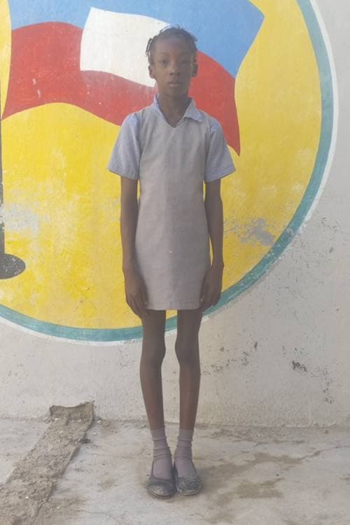 An unsponsored girl named Widmene from Haiti who is vulnerable to exploitation and has waited 717 days for a sponsor.