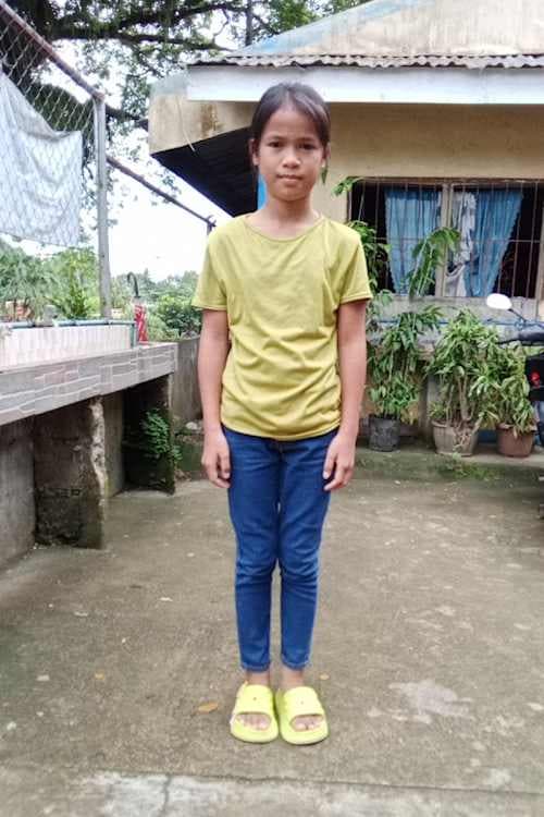 An unsponsored girl named Iza from Philippines who has waited 245 days for a sponsor.