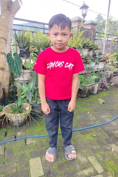 An unsponsored boy named Praysel from Indonesia who has waited 566 days for a sponsor.