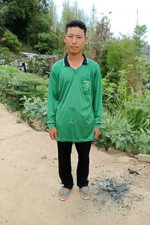 An unsponsored boy named Sangchai from Thailand who has waited 363 days for a sponsor.