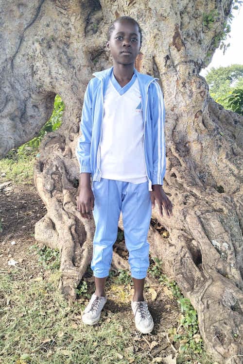 An unsponsored girl named Natasha from Kenya who lives in an AIDS-affected area and has waited 589 days for a sponsor.