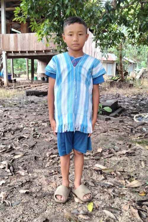 An unsponsored boy named Saw-eh-lerlee from Thailand who has waited 556 days for a sponsor.
