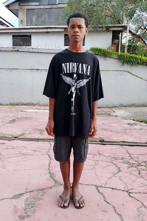 An unsponsored boy named Pandi from Indonesia who has waited 419 days for a sponsor.