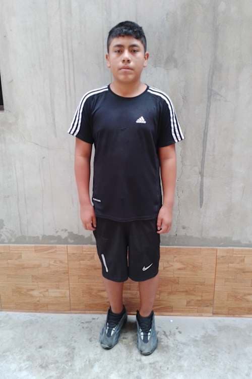 An unsponsored boy named Dayron from Peru who has waited 571 days for a sponsor.