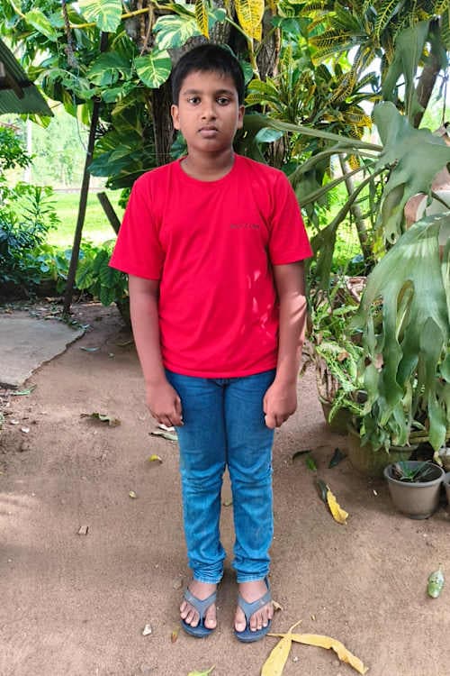 An unsponsored boy named Wishmitha from Sri Lanka who has waited 509 days for a sponsor.