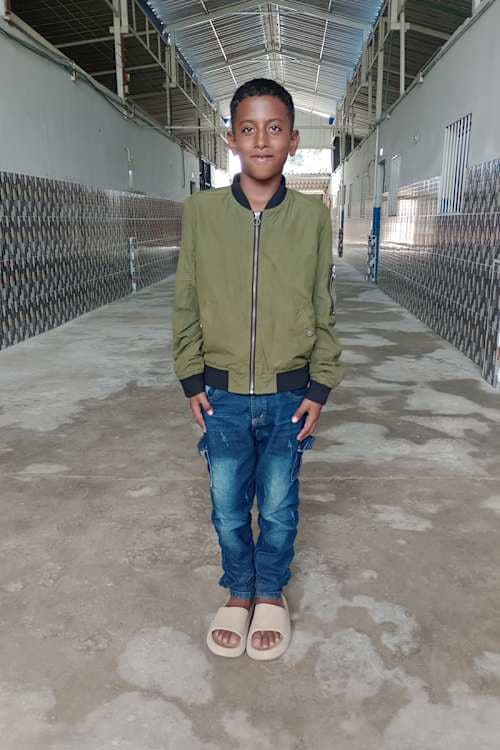An unsponsored boy named Juan from Colombia who has waited 759 days for a sponsor.