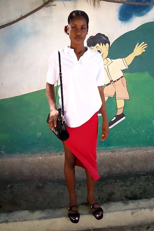 An unsponsored girl named Michelene from Haiti who is vulnerable to exploitation and has waited 835 days for a sponsor.