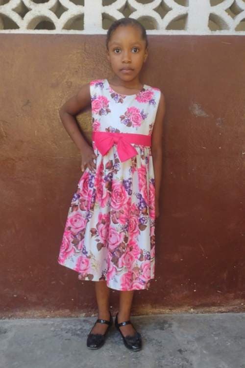 An unsponsored girl named Sasou from Haiti who is vulnerable to exploitation and has waited 906 days for a sponsor.