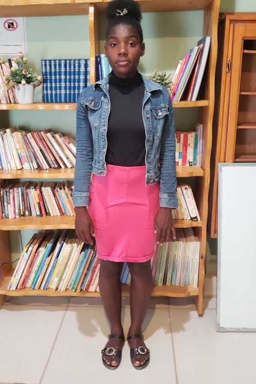An unsponsored girl named Venia from Haiti who is vulnerable to exploitation and has waited 518 days for a sponsor.