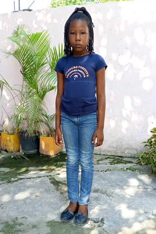 An unsponsored girl named Tessa from Haiti who is vulnerable to exploitation and has waited 823 days for a sponsor.