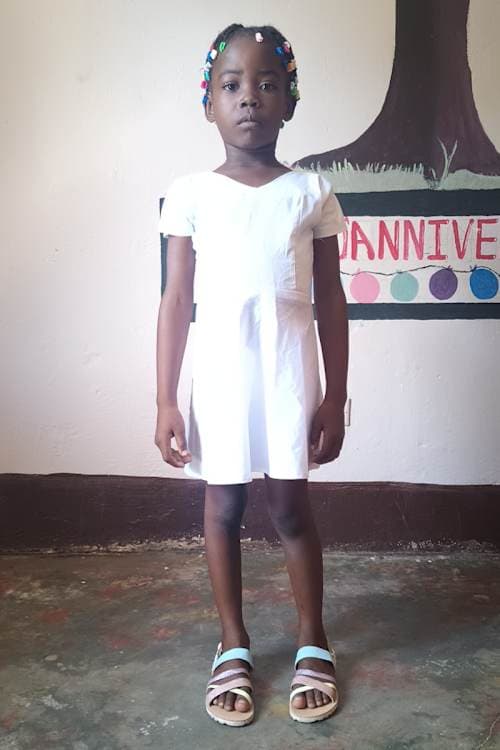 An unsponsored girl named Djina from Haiti who is vulnerable to exploitation and has waited 803 days for a sponsor.