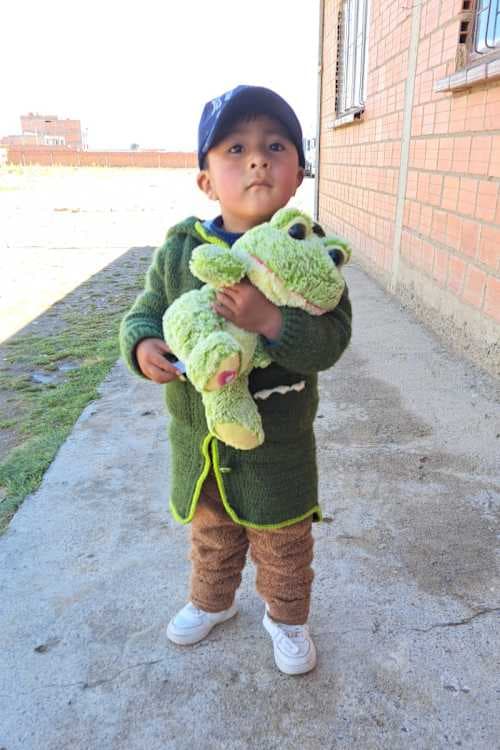 An unsponsored boy named Jhoan from Bolivia who has waited 425 days for a sponsor.