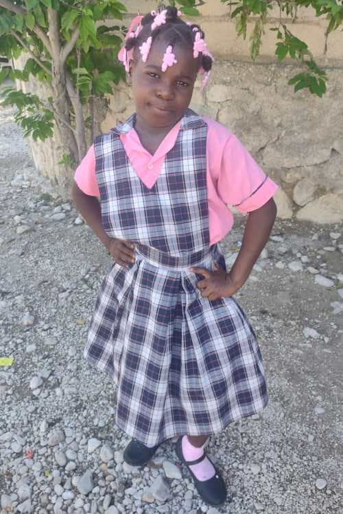 An unsponsored girl named Chrisnaika from Haiti who is vulnerable to exploitation and has waited 777 days for a sponsor.