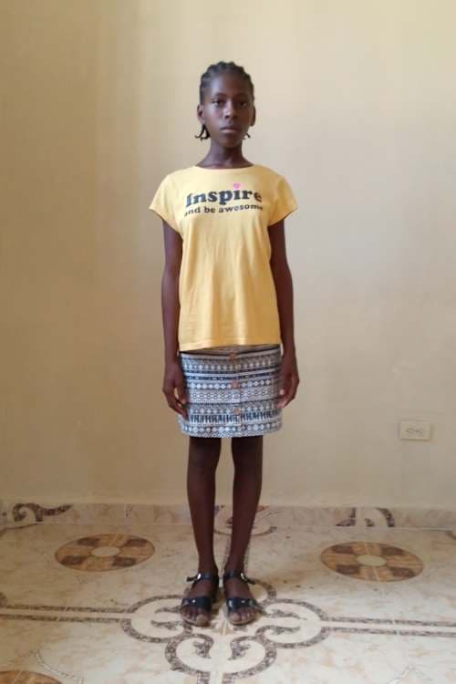 An unsponsored girl named Didine from Haiti who is vulnerable to exploitation and has waited 384 days for a sponsor.