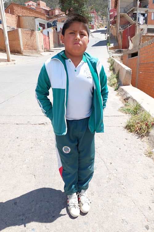 An unsponsored boy named Leonel Balerio from Bolivia who has waited 594 days for a sponsor.