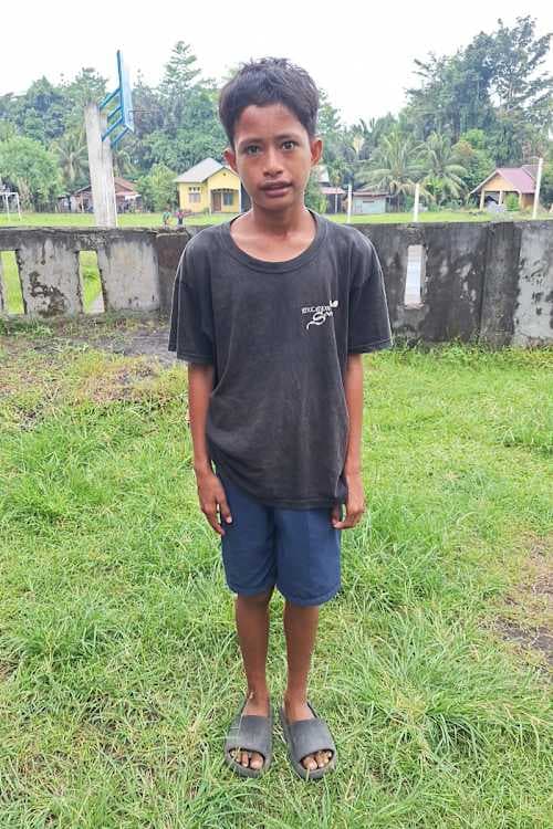 An unsponsored boy named Bernat from Indonesia who has waited 521 days for a sponsor.