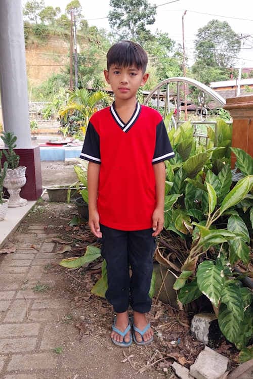 An unsponsored boy named Chiro from Indonesia who has waited 526 days for a sponsor.