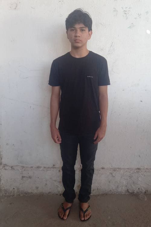 An unsponsored boy named Henrique from Brazil who has waited 432 days for a sponsor.