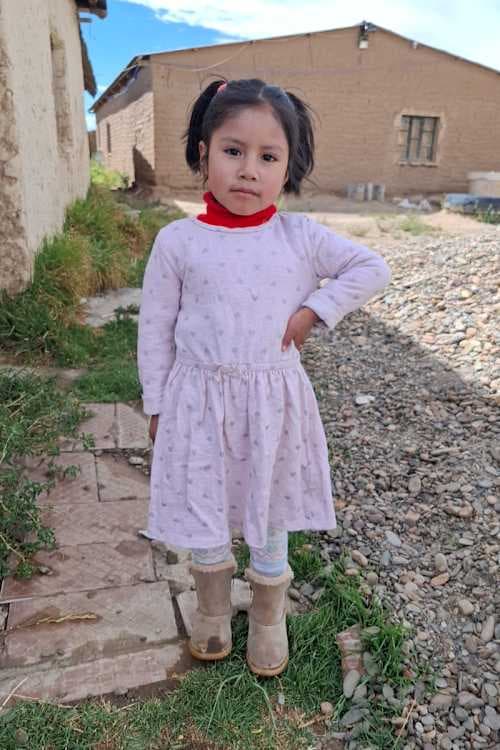 An unsponsored girl named Ada from Bolivia who has waited 448 days for a sponsor.