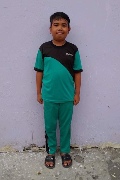 An unsponsored boy named Matthew from Indonesia who has waited 591 days for a sponsor.