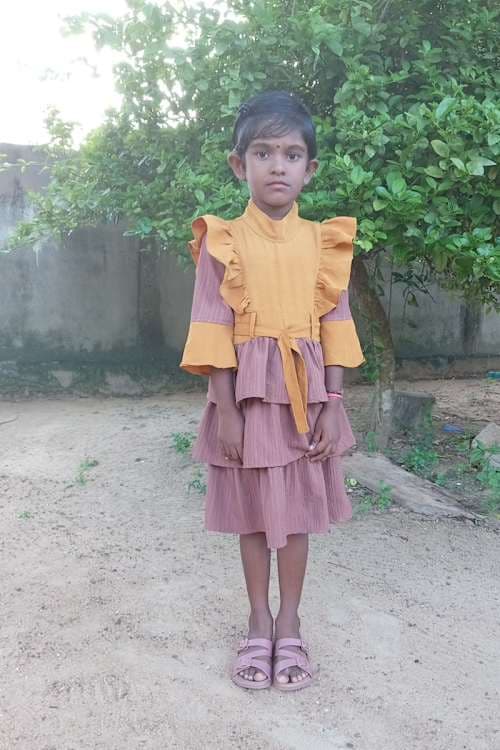 An unsponsored girl named Kashviny from Sri Lanka who has waited 542 days for a sponsor.