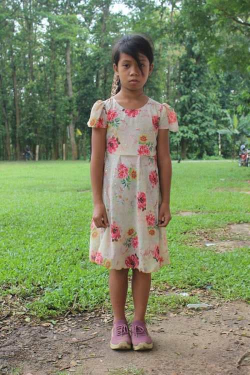 An unsponsored girl named Happy from Bangladesh who is vulnerable to exploitation and has waited 574 days for a sponsor.