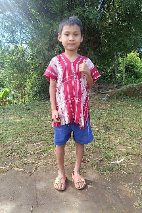 An unsponsored boy named Lapuey from Thailand who has waited 500 days for a sponsor.