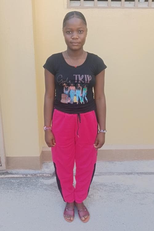 An unsponsored girl named Lourdine from Haiti who is vulnerable to exploitation and has waited 432 days for a sponsor.