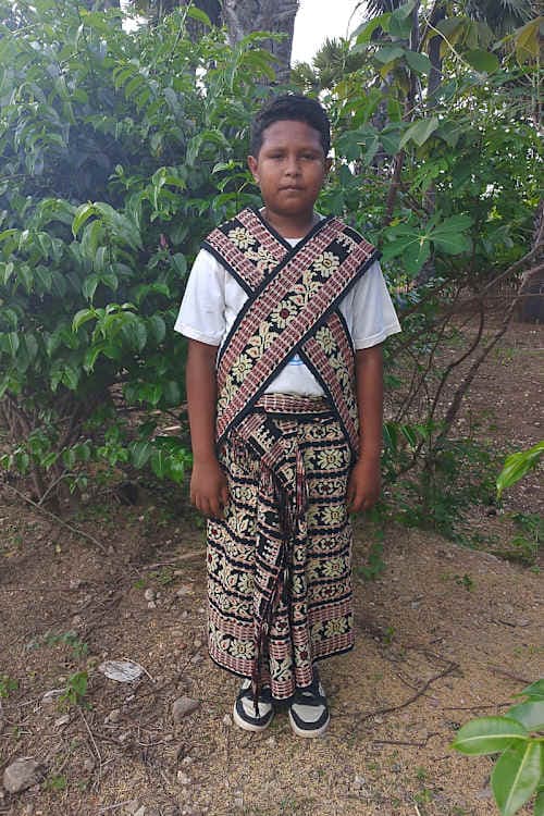An unsponsored boy named Naldi from Indonesia who has waited 512 days for a sponsor.