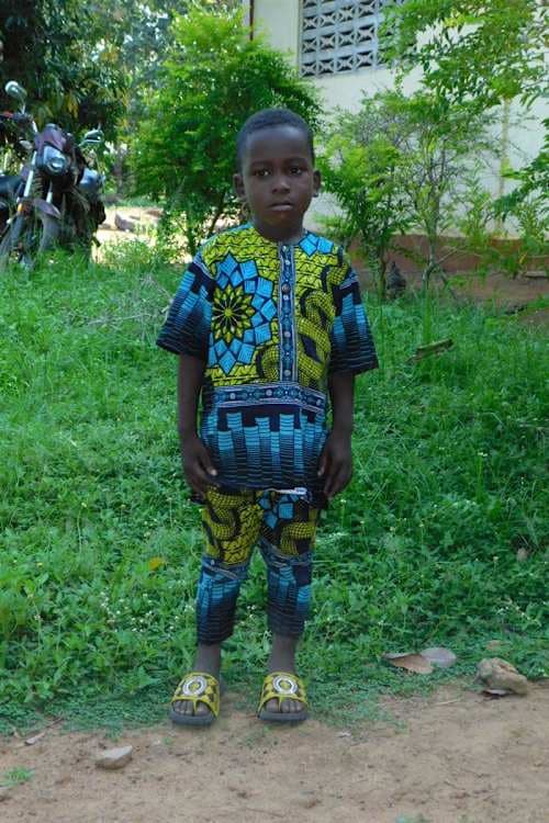 An unsponsored boy named John from Togo who lives in an AIDS-affected area, is vulnerable to exploitation and has waited 259 days for a sponsor.