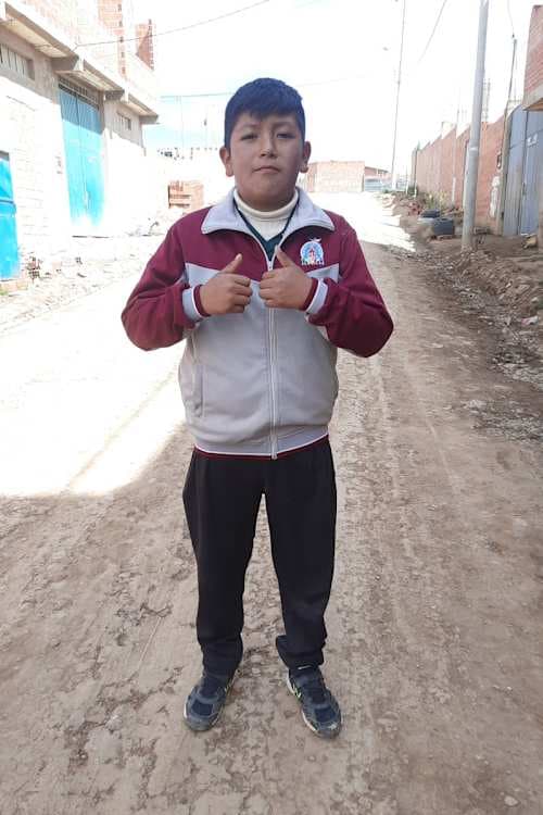 An unsponsored boy named Jhovanni from Bolivia who has waited 481 days for a sponsor.